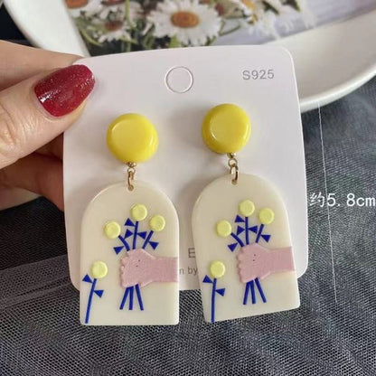 Aretes de dibujos animados artísticos