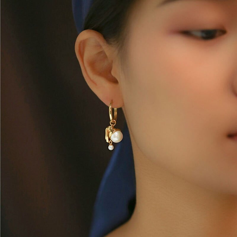 Girl with a pearl vintage earrings