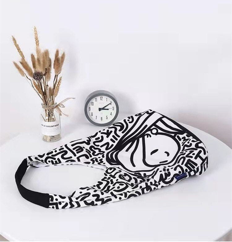 Fille avec une boucle d'oreille en perle doodles Sac à bandoulière